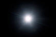 canvas print picture - Optical lens flare on black background.