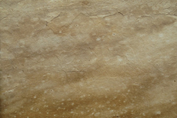 Wall Mural - Brown plastic texture with imitation stone, background.