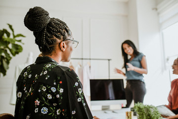 Women coworkers working together