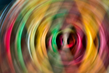 multi-colored plasticine texture swirl photographed at long exposure