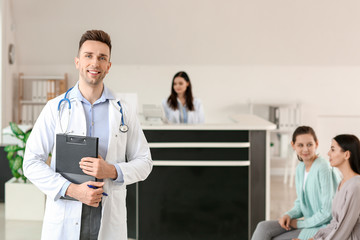 Wall Mural - Male doctor in hall of clinic