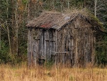 Abandoned Shed On Field