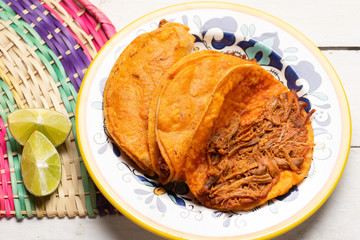 Mexican beef  birria tacos on white background