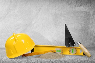 Canvas Print - Safety helmet and construction tools on the desk