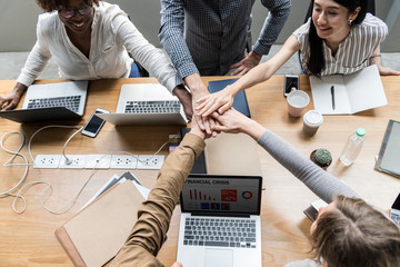 Poster - Team of business people stacking hands