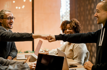 Canvas Print - Two people giving a fist bump