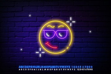 Wall Mural - neon happy emoticons with sunglasses, April fools ' Day. Vector silhouette of a neon pair of cute emoticons, consisting of contours, illuminated on a dark background with text.