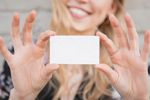 Woman Holding A Business Card