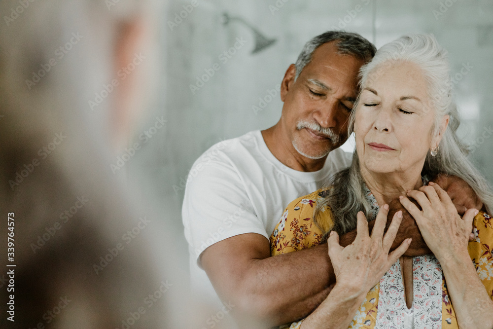 Adorable mixed senior couple
