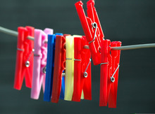 Close-up Of Colorful Clothespins On Wire