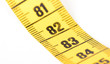 © michaklootwijk - Close-up of a yellow measuring tape isolated on white - 83