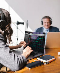 Wall Mural - Businesswoman interviewed for a podcast