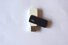White USB Flash Drive On A Light Background
