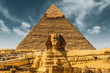 canvas print picture - Egypt. Egyptian sphinx pyramid background. Cairo. Giza. Travel background. Architectural monument. The tombs of the pharaohs. Vacation holidays background wallpaper