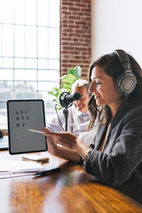 Wall Mural - Woman recording a podcast