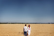 © Евгений Береславский - girl with a guy in a dress in wheat