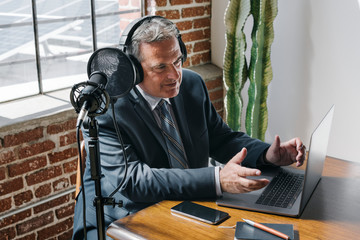 Wall Mural - Businessman recording his own show