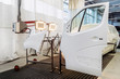 © valdisskudre - Automobile prepared for painting car details and exterior parts.