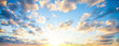 Sky clouds background. Beautiful landscape with clouds and orange sun on sky