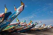 Traditional Painted Wooden Fishing Boat In Djiffer, Senegal. West Africa.