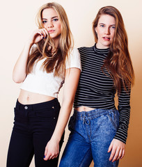 best friends teenage girls together having fun, posing emotional on white background, besties happy smiling, lifestyle people concept closeup. making selfie