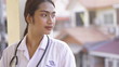 © Apinya - Medical physician doctor woman,Young of happy female smile face with stethoscope on blurred hospital background.