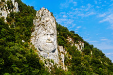 The Face Of The Dacian King Decebal Is A 55 M High Bas-relief Located On The Rocky Bank Of The Danube, Between The Towns Of Echelnita And Dubova, Near The City Of Orsova, Romania.