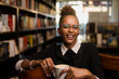 © Samuel B. - Black african american young yoman drinking coffee