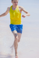 Man running on the beach