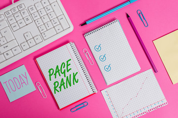 Poster - Conceptual hand writing showing Page Rank. Concept meaning a value assigned to a web page as a measure of its popularity Writing equipments and computer stuff placed on plain table