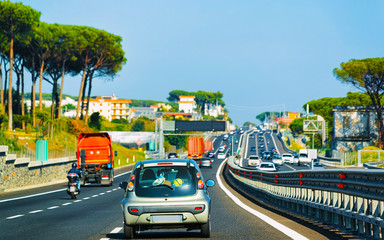 Canvas Print - Cars on road in Italy reflex