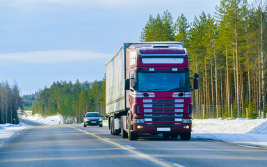 Wall Mural - Truck in road at winter Rovaniemi reflex