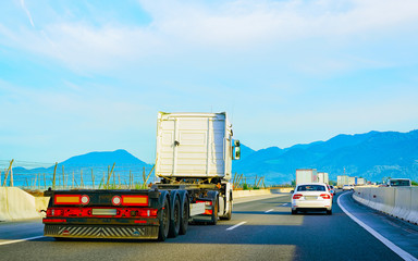 Wall Mural - Truck without trailer box in asphalt highway road Slovenia reflex