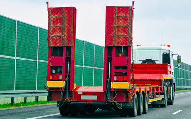 Canvas Print - Truck without trailer box at asphalt highway road Poland reflex