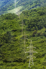 Aerial view of high voltage power poles on Hai Van pass, Bach Ma mountain, Hue, Vietnam. Hai Van pass from Hue to Da Nang
