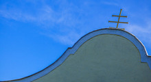 Low Angle View Of Church Against Blue Sky