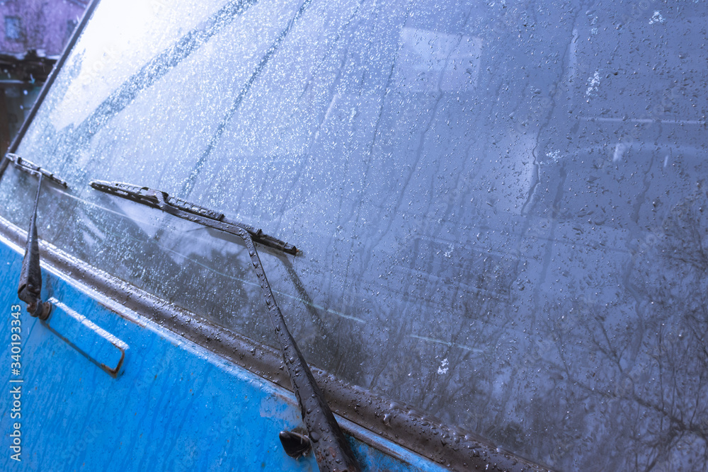 background texture of the blue color of the car surface and .car wipers ...
