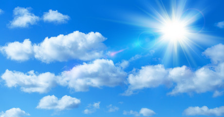 Wall Mural - sunny background, blue sky with white clouds and sun