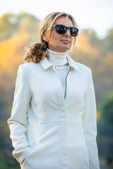 Wall Mural - middle-aged woman walking in city park