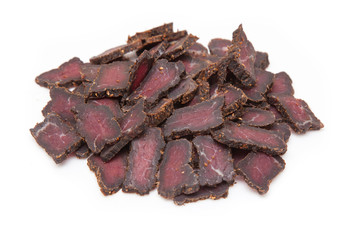 Wall Mural - Beef Biltong, South African Beef Jerky isolated on a white studio background.