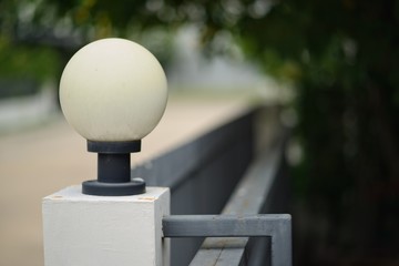 White lanterns on the Ryuai fence wall in the daytime