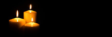Flame Candles Isolated On Black Background. Close Up.