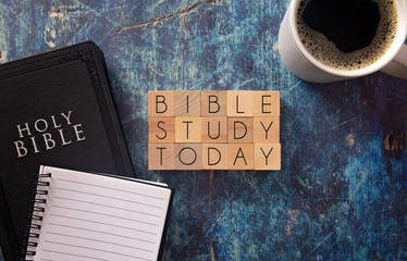 Poster - Bible Study Today Written in Block Letters on a Blue Wood Table with a Bible