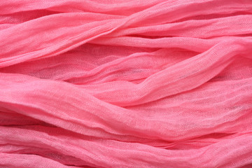 light textile cloth texture of pink color, winter scarf
