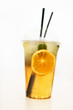 one fresh lemonade with orange slice in plastic cup on white background, ice tea, isolated, front view