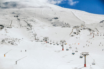 snowy mountains skiers landscapes