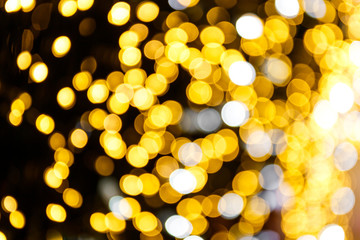 Abstract golden and yellow bright circle bokeh background