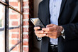 © rawpixel.com - Businessman using a smartphone