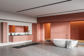  Orange and white bathroom corner, sink and tub