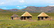 Traditional rural round huts in a Lesotho village in the countryside near Sani Pass road,  Basotho Drakensberg
